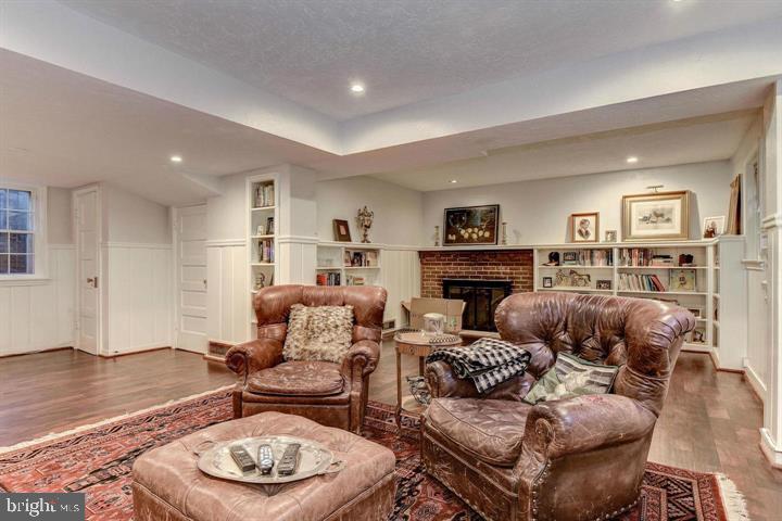 4920 Palisade Lane Northwest Washington, DC 20016 - Photo 46 of 70 Cozy lower level living space with fireplace