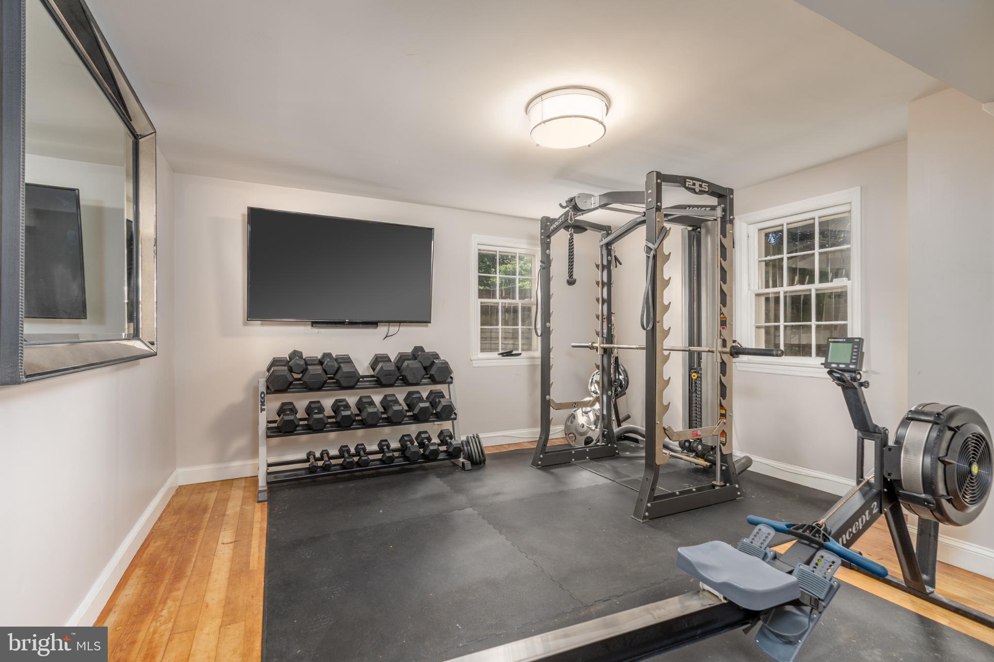 4920 Palisade Lane Northwest Washington, DC 20016 - Photo 52 of 70 Modern home gym with versatile equipment