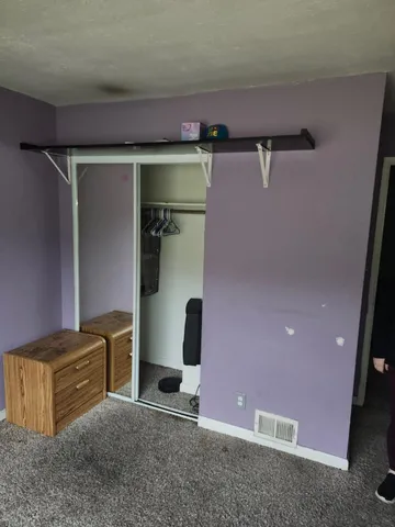 a kitchen with a sink and a stove top oven