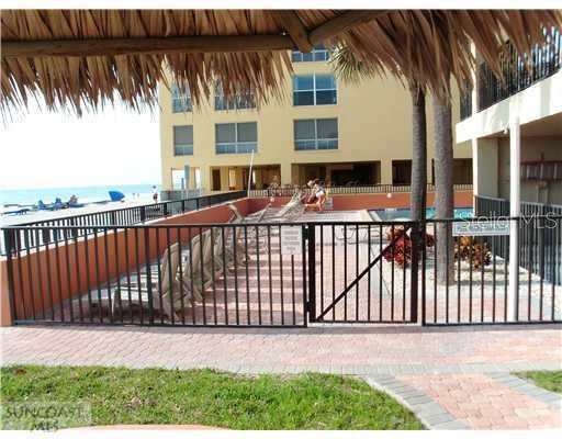 Exterior Front - Exterior looking north of complex on the Gulf.  Pool is to right.