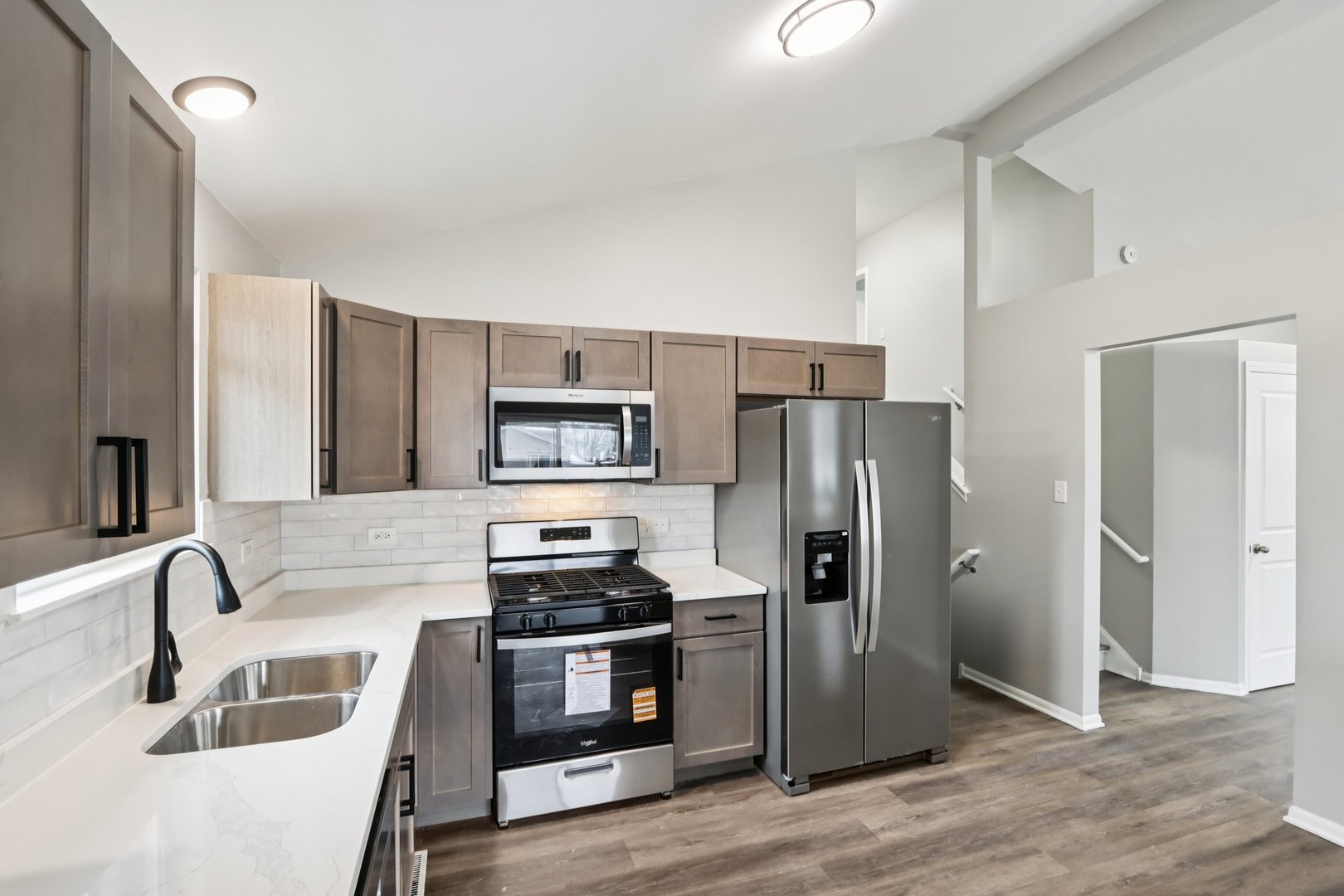 3348 Willow Lane Markham, IL 60428 - Photo 12 of 41 a kitchen with a refrigerator sink and stainless steel appliances