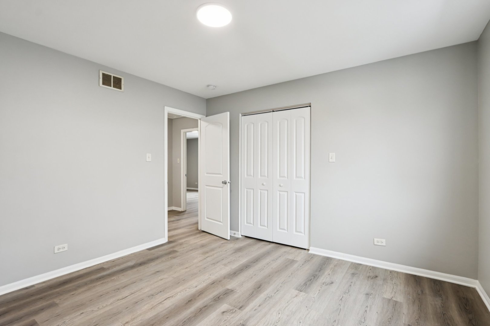 3348 Willow Lane Markham, IL 60428 - Photo 24 of 41 a view of an empty room and wooden floor