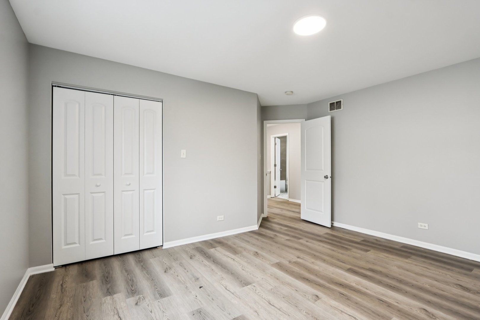 3348 Willow Lane Markham, IL 60428 - Photo 26 of 41 a view of an empty room with wooden floor