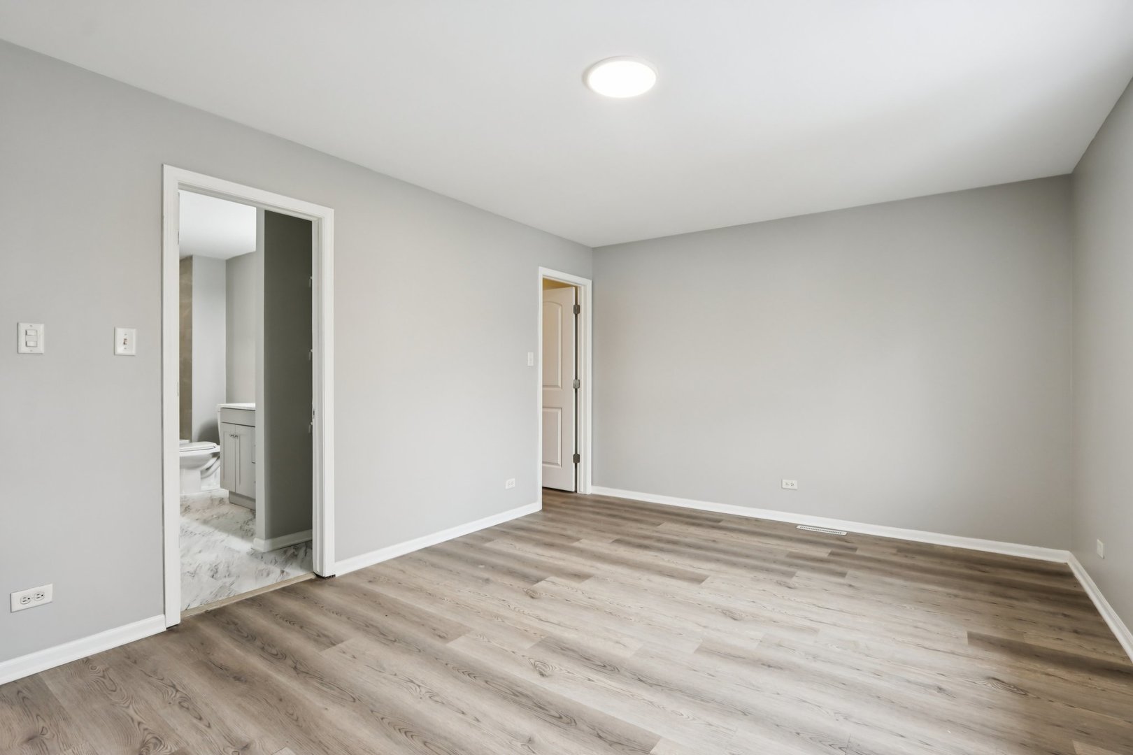 3348 Willow Lane Markham, IL 60428 - Photo 29 of 41 a view of an empty room with wooden floor and closet