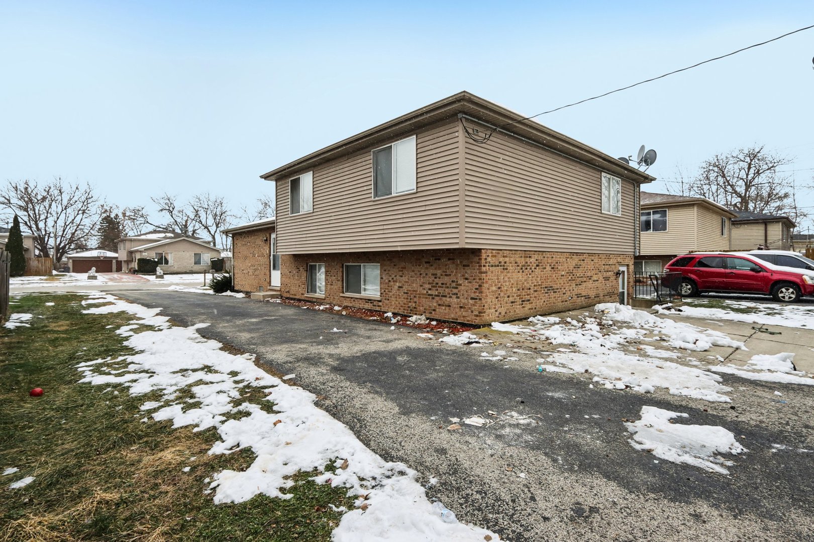 3348 Willow Lane Markham, IL 60428 - Photo 5 of 41 a front view of a house with a yard