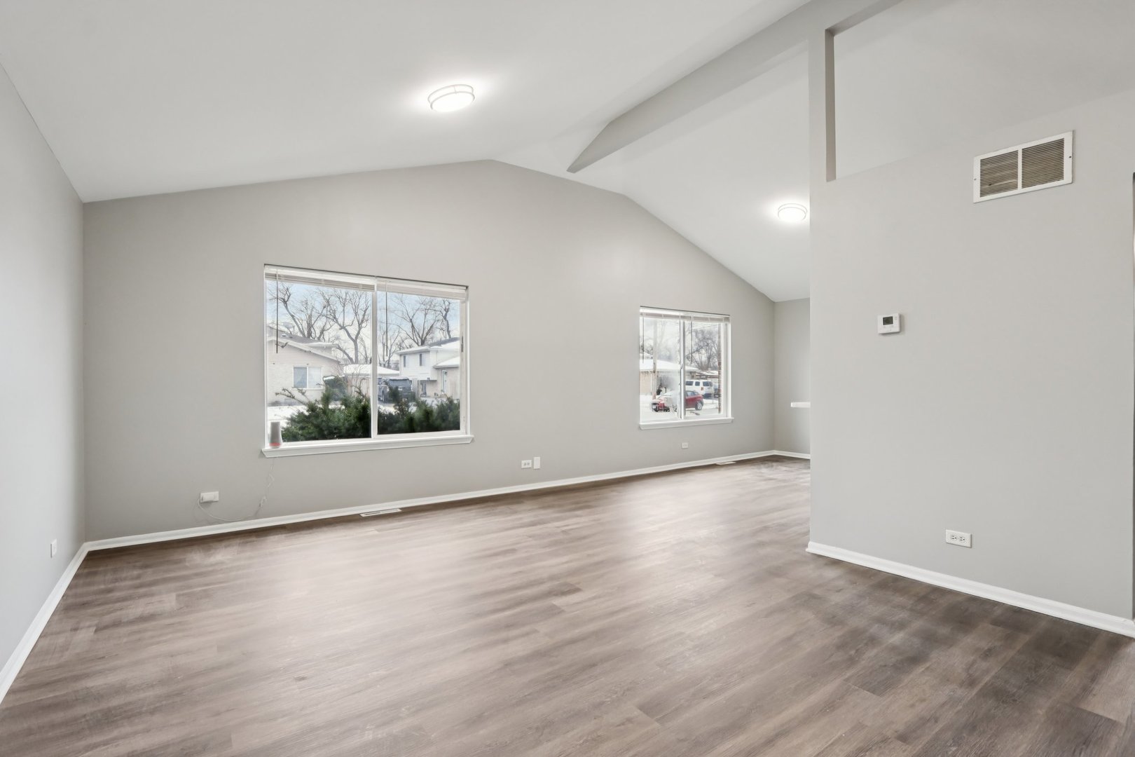3348 Willow Lane Markham, IL 60428 - Photo 7 of 41 an empty room with wooden floor and window