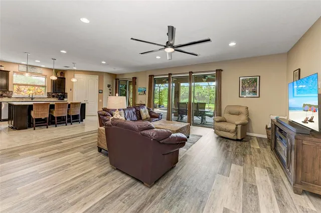 a kitchen with a refrigerator and a sink