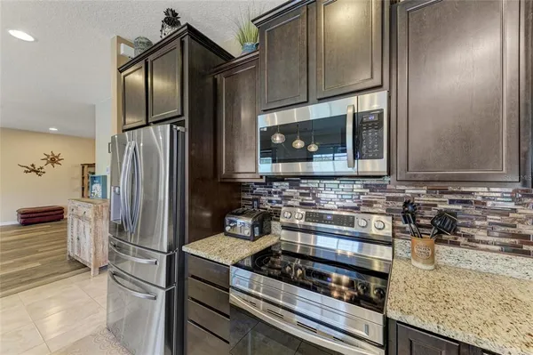 a view of a swimming pool with a patio