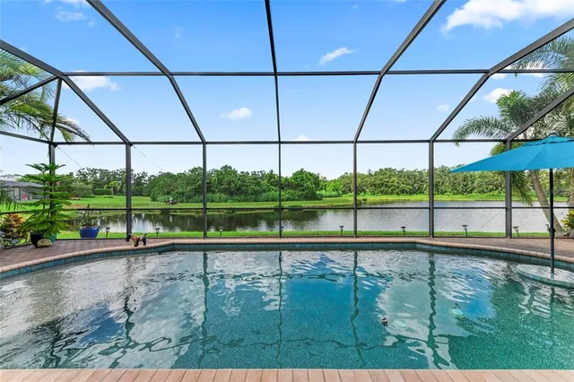 an aerial view of a house with a garden and outdoor space