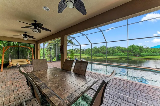 a bedroom with a bed and a tv on the dresser