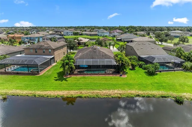 a bathroom with a sink mirror and toilet