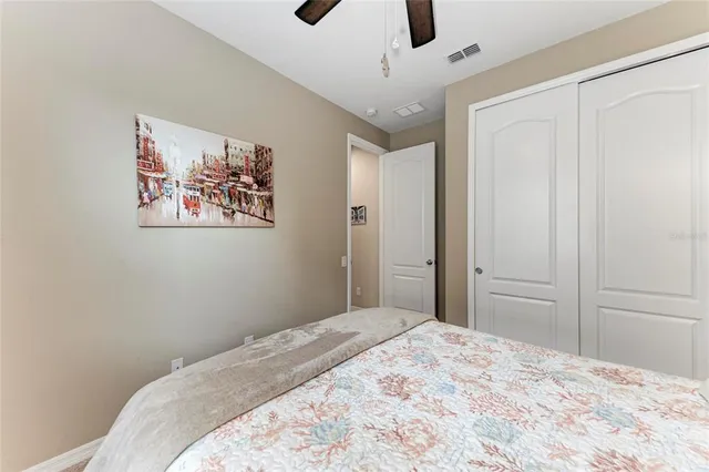 a view of a patio with a table chairs and a yard