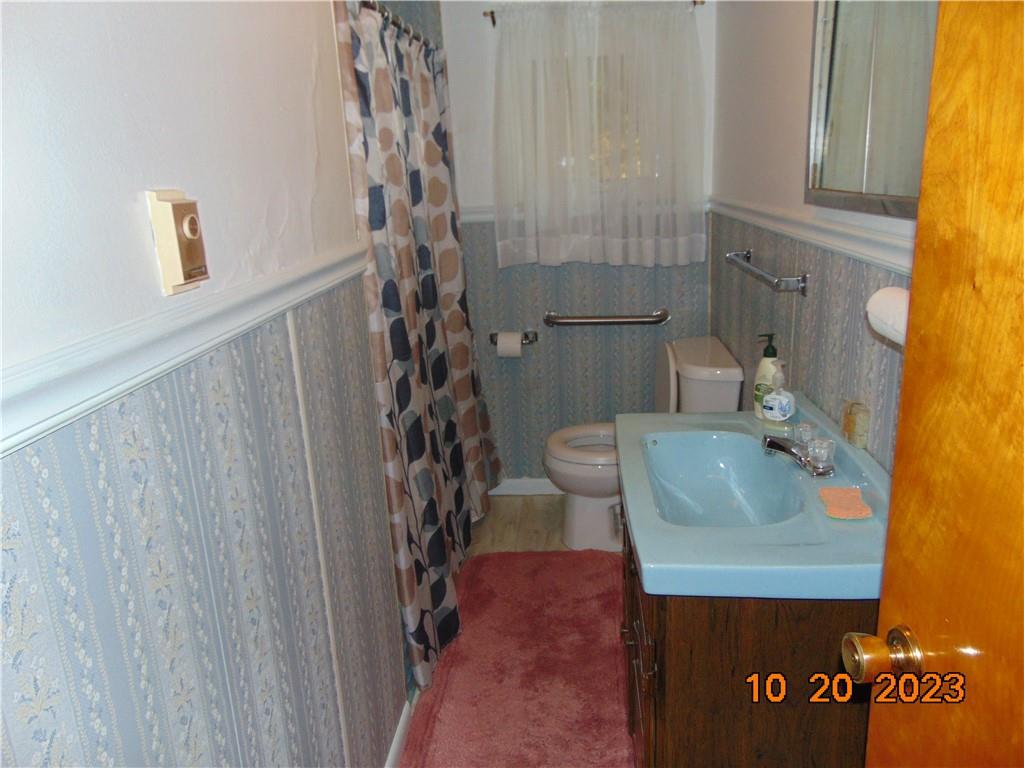 168 Bottom Road Mill Run, PA 15464 - Photo 23 of 26 a bathroom with a sink and toilet