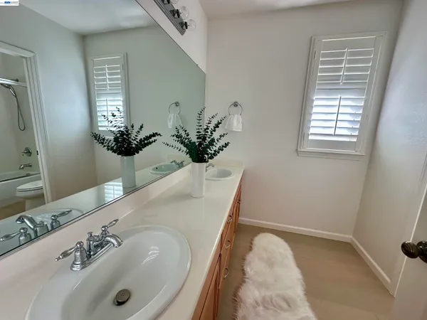 a bathroom with a sink and a bathtub
