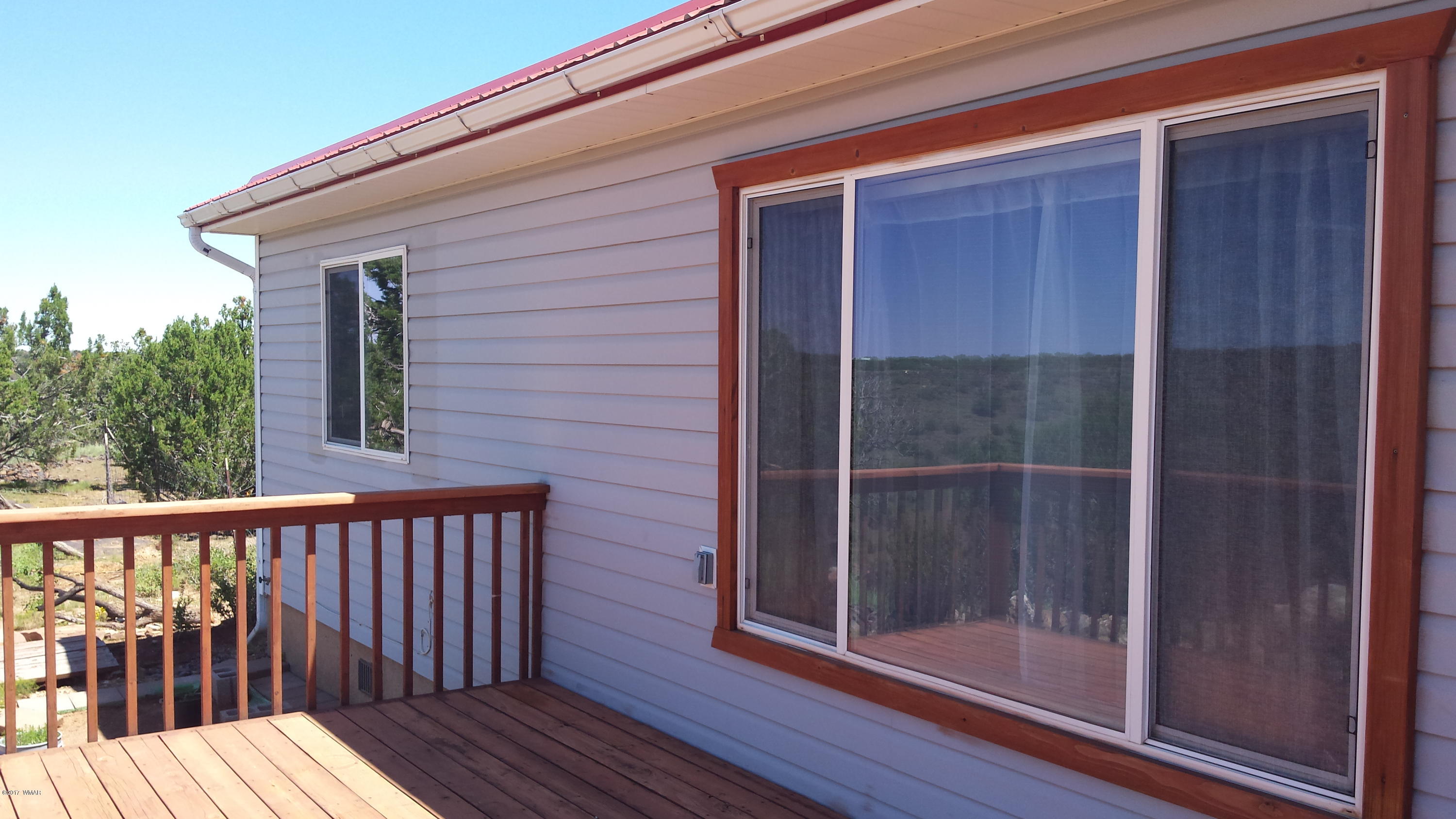8559 Eagles Flight Road Show Low, AZ 85901 - Photo 16 of 22 a view of wooden balcony