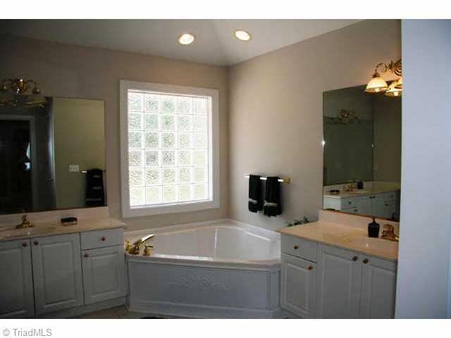 2601 Burch Point High Point, NC 27265 - Photo 5 of 9 Other. His and Her bath with separate tub and shower and dual vanitites.