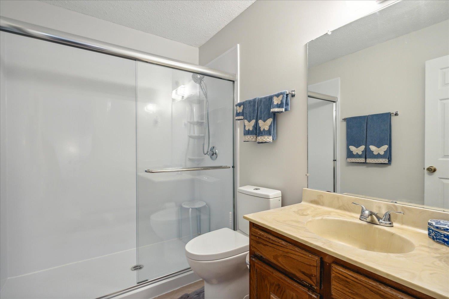 4419 Logan's Path Road Millington, TN 38053 - Photo 15 of 21 a bathroom with a sink toilet and shower