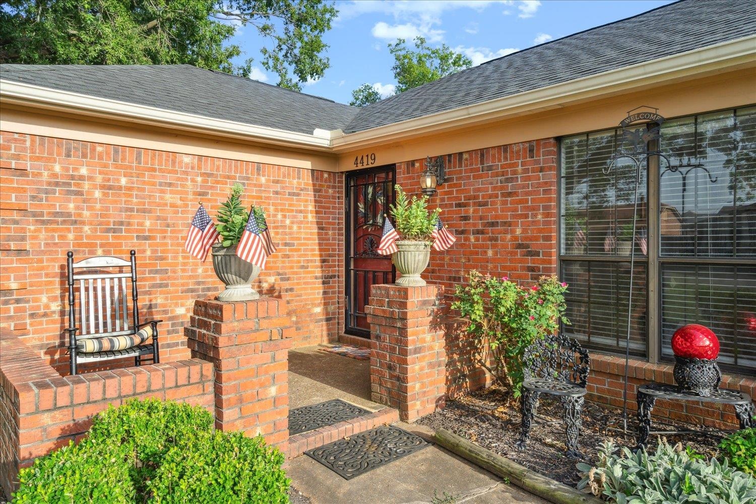 4419 Logan's Path Road Millington, TN 38053 - Photo 2 of 21 a front view of a house with a garden