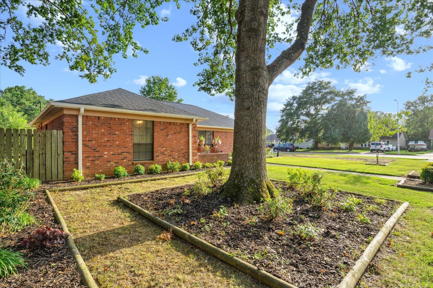 4419 Logan's Path Road Millington, TN 38053 - Photo 3 of 21 a front view of a house with garden