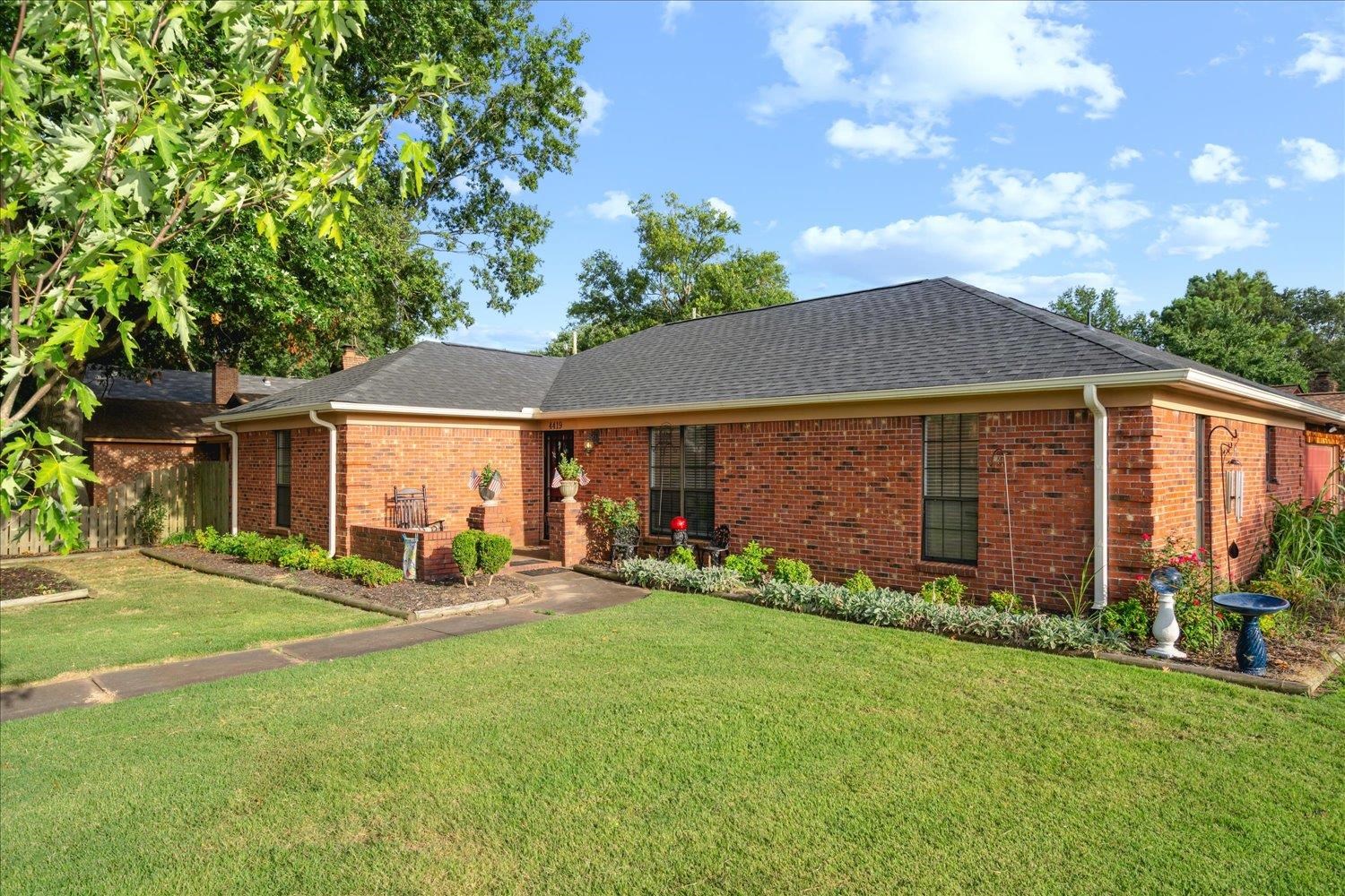 4419 Logan's Path Road Millington, TN 38053 - Photo 4 of 21 a view of a house with backyard and garden