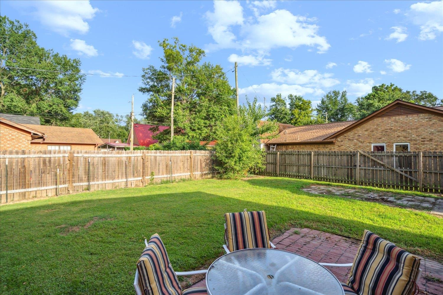 4419 Logan's Path Road Millington, TN 38053 - Photo 6 of 21 a view of a chair and table in the yard