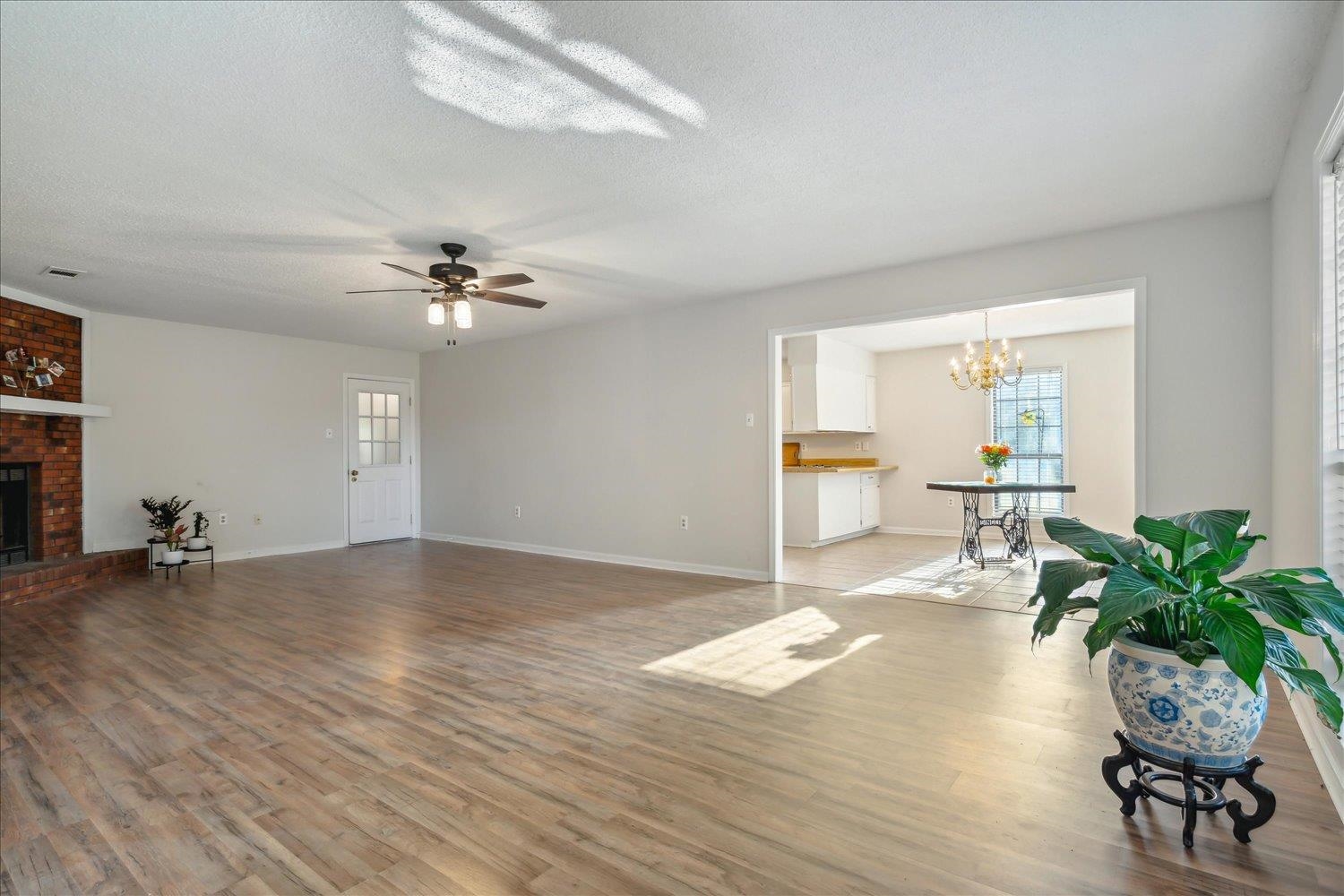 4419 Logan's Path Road Millington, TN 38053 - Photo 8 of 21 a living room with furniture and a chandelier