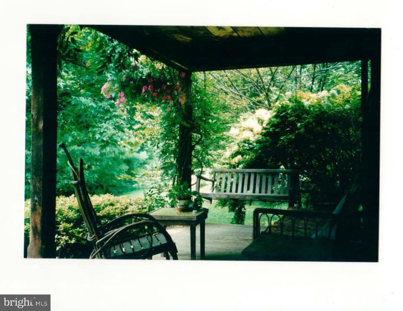 6015 Georgetown Road Broad Run, VA 20137 - Photo 46 of 51 Swing on front porch-tenant cottage