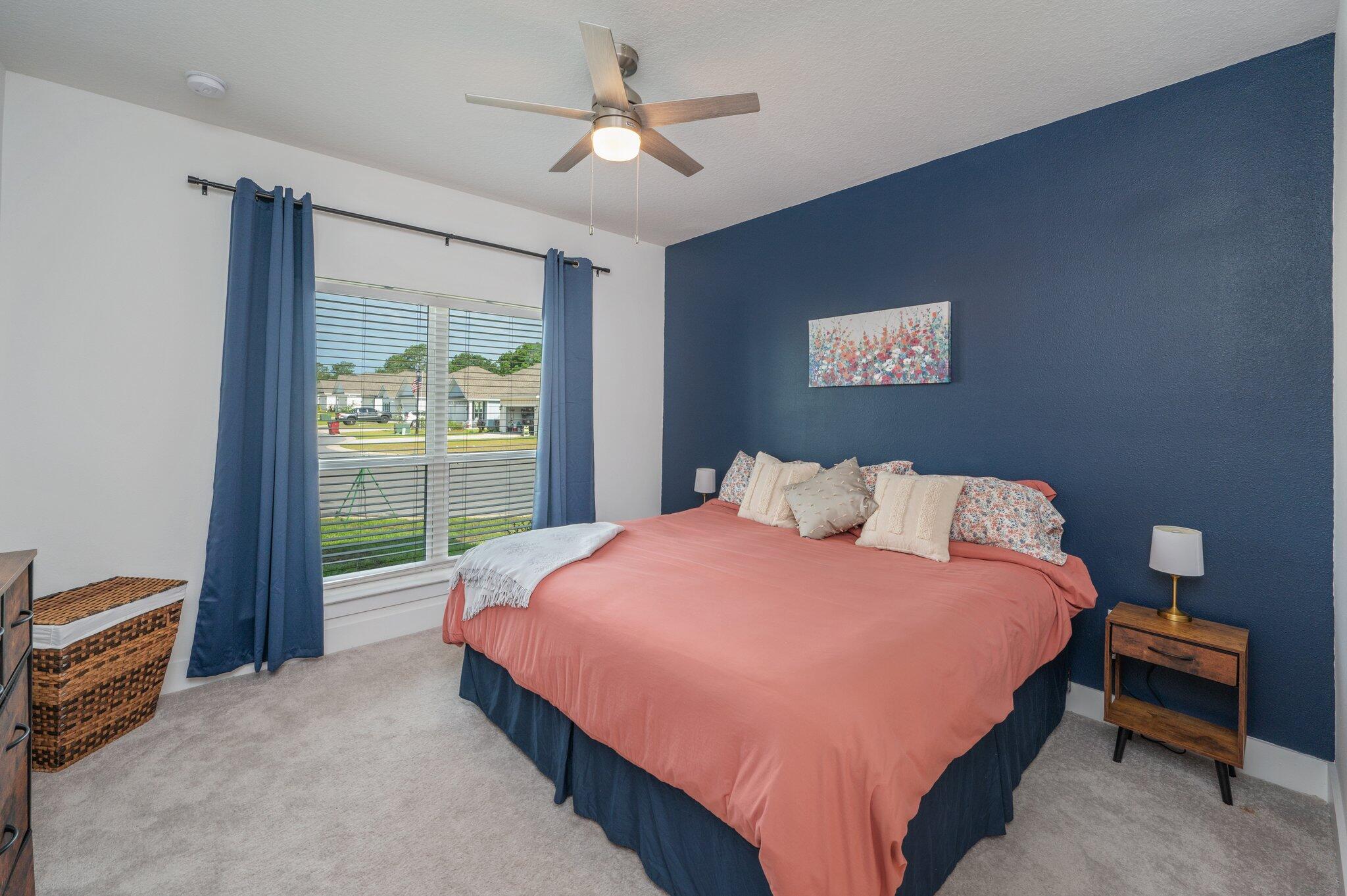 134 Blooming Cove Crestview, FL 32539 - Photo 18 of 50 a bedroom with a bed and a window