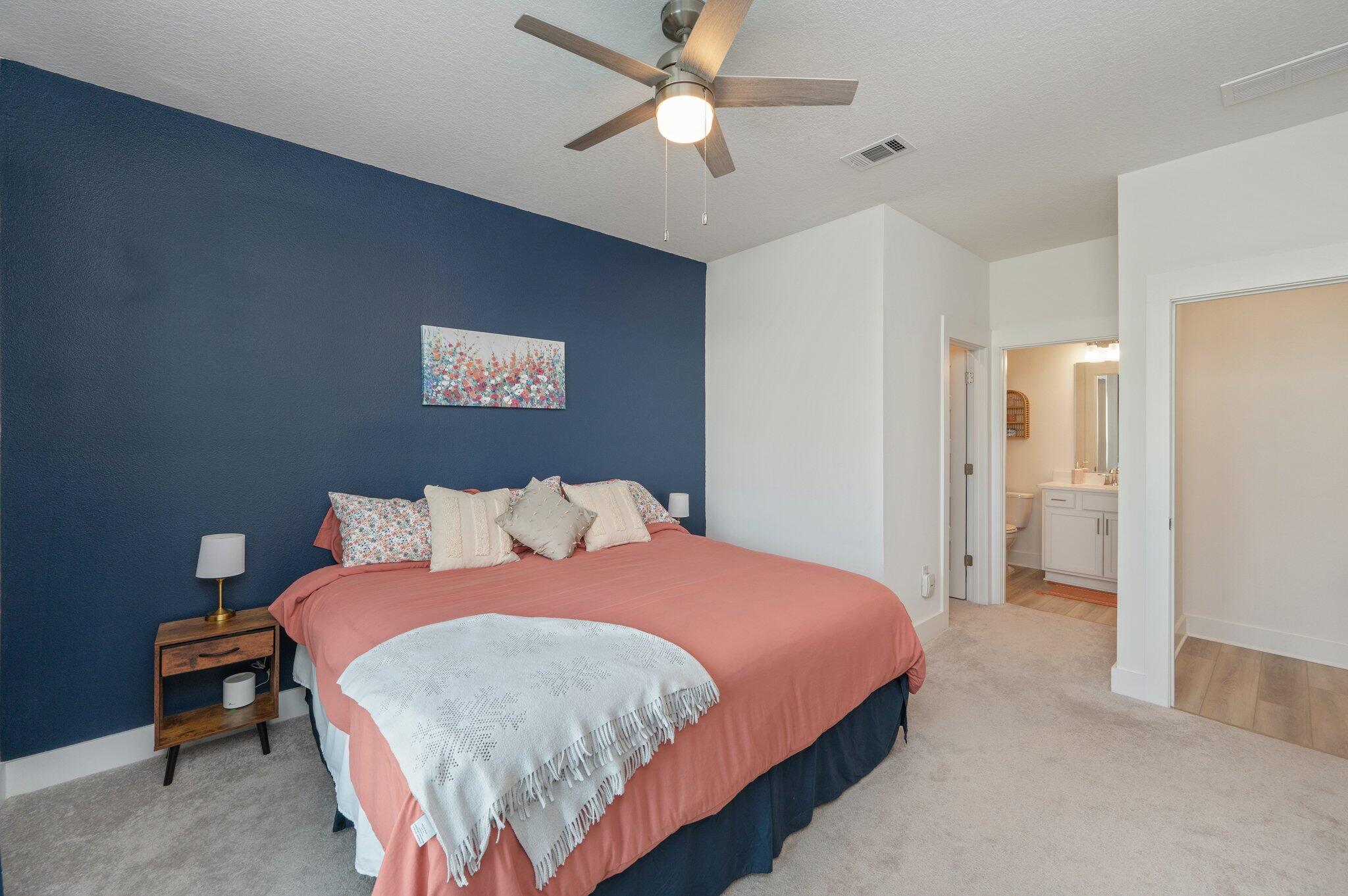 134 Blooming Cove Crestview, FL 32539 - Photo 19 of 50 a bedroom with a bed and a chandelier