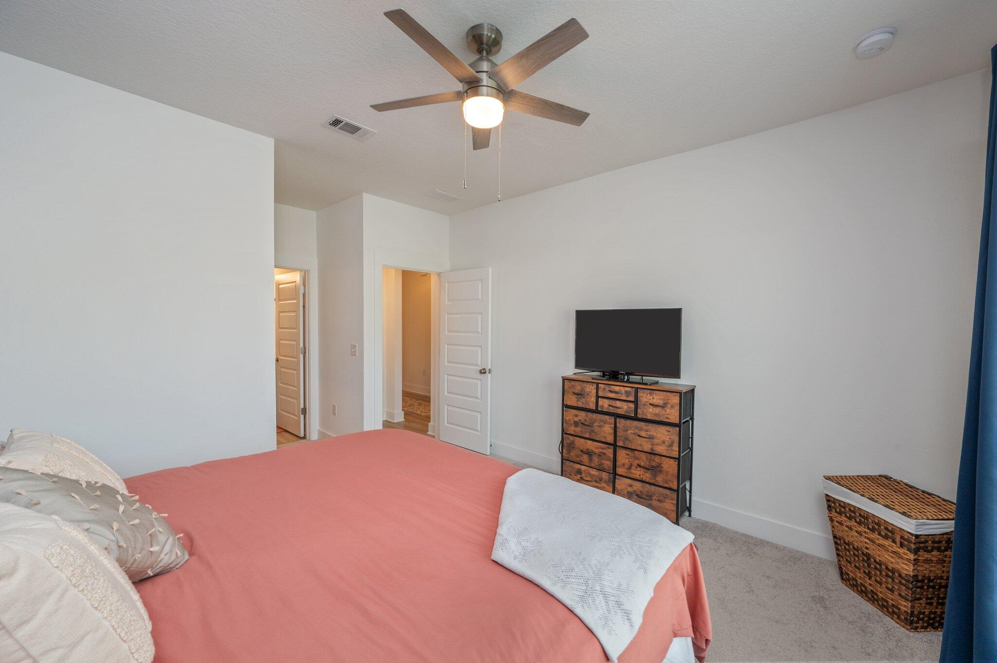 134 Blooming Cove Crestview, FL 32539 - Photo 20 of 50 a bedroom with a bed and a television