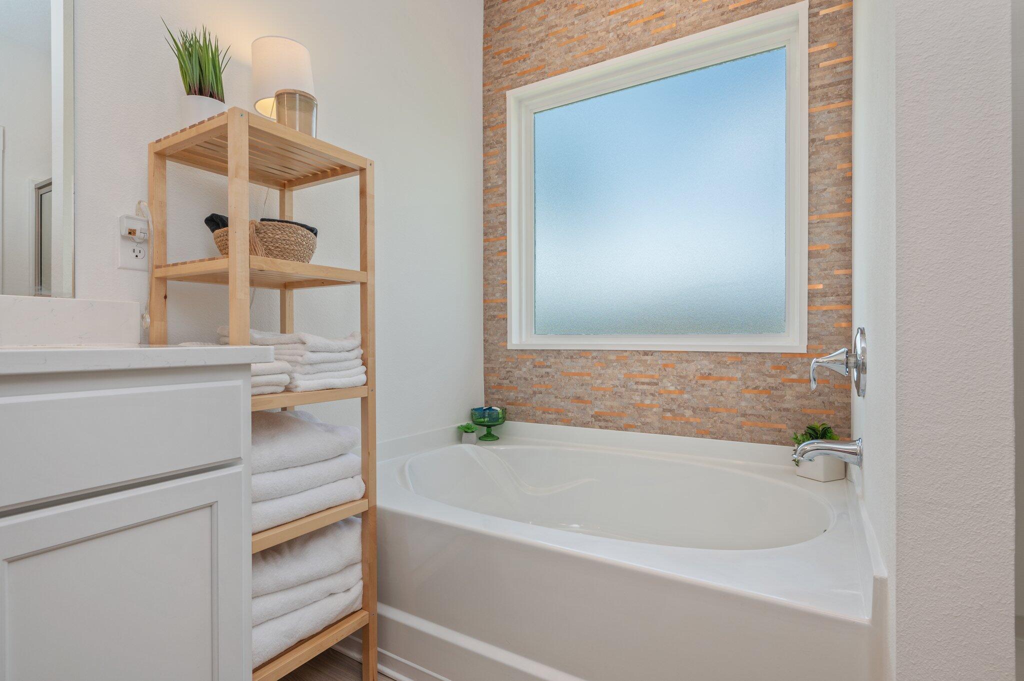 134 Blooming Cove Crestview, FL 32539 - Photo 28 of 50 a bathroom with a tub and a shower