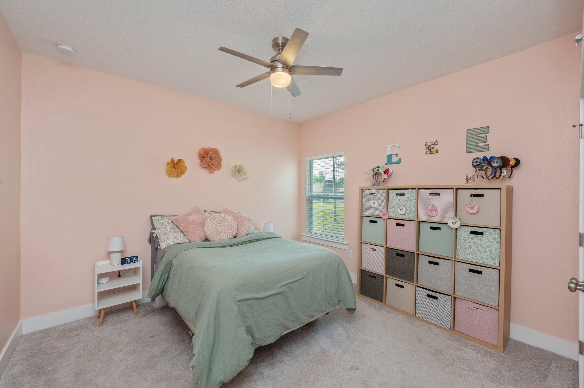 134 Blooming Cove Crestview, FL 32539 - Photo 32 of 50 a bedroom with a bed and a window