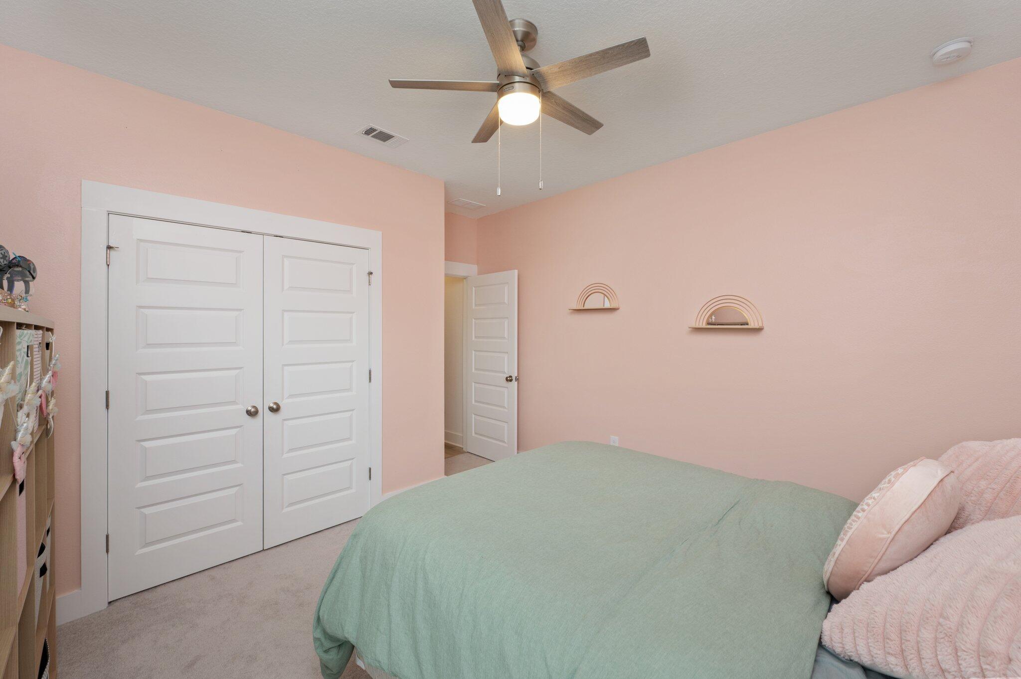 134 Blooming Cove Crestview, FL 32539 - Photo 33 of 50 a bedroom with a bed and a ceiling fan