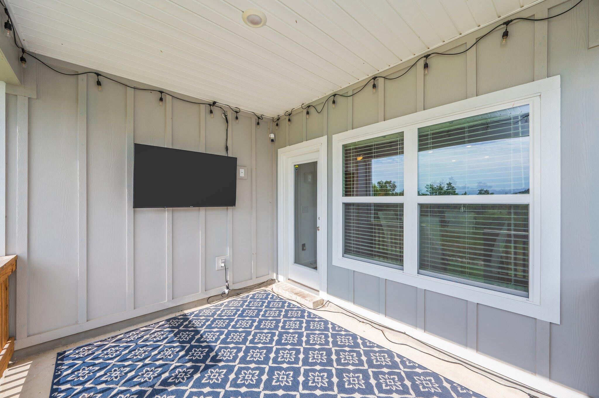 134 Blooming Cove Crestview, FL 32539 - Photo 45 of 50 a view of a livingroom with a flat screen tv