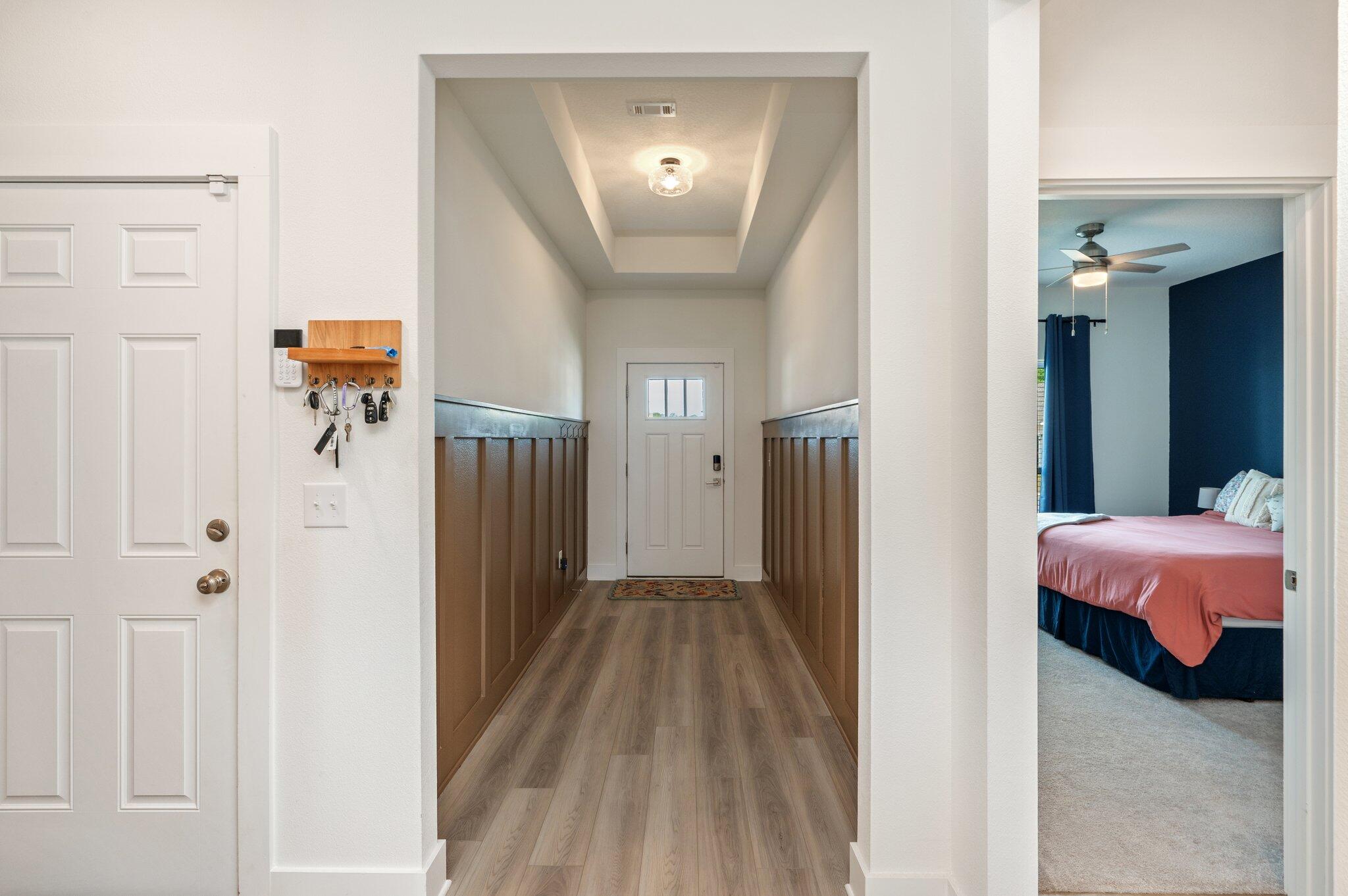 134 Blooming Cove Crestview, FL 32539 - Photo 5 of 50 a view of a hallway with a livingroom and a mirror