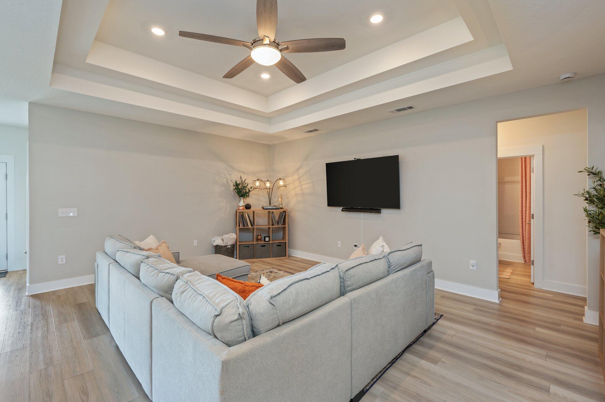 134 Blooming Cove Crestview, FL 32539 - Photo 6 of 50 a living room with furniture and a flat screen tv