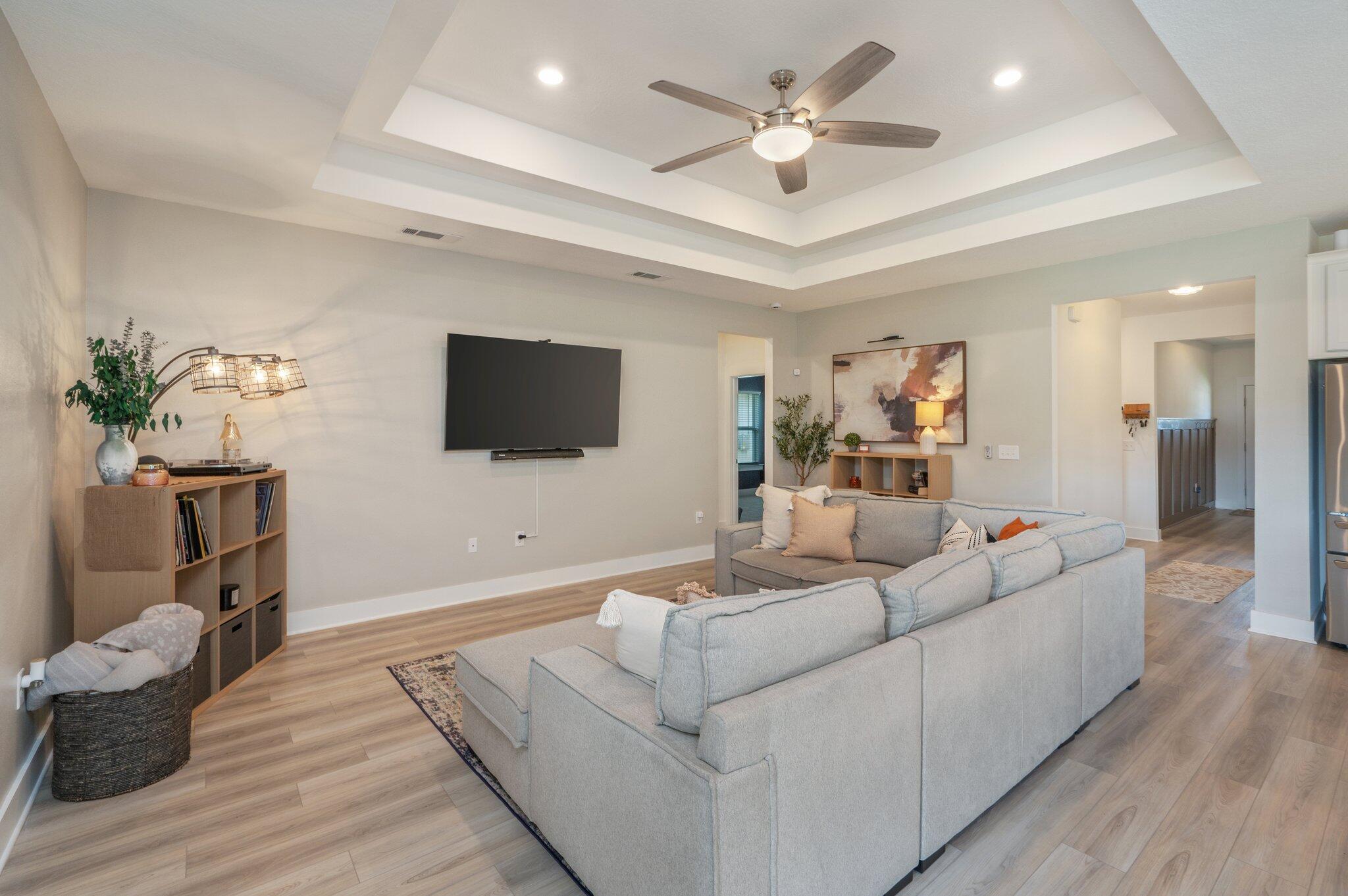 134 Blooming Cove Crestview, FL 32539 - Photo 9 of 50 a living room with furniture and a flat screen tv