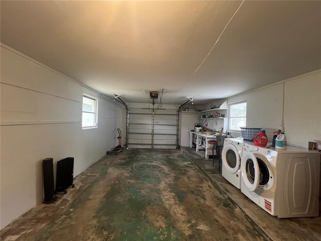 129 Northshore Terrace Punta Gorda, FL 33980 - Photo 24 of 37 a view of a storage & utility room with washer and dryer