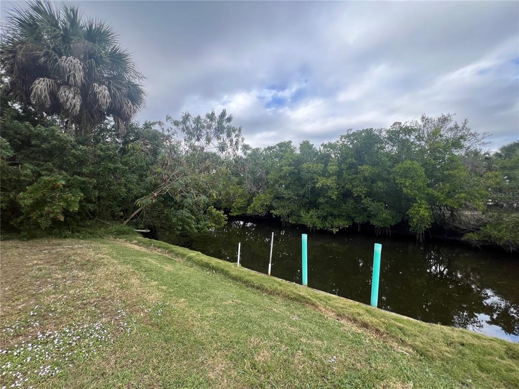 129 Northshore Terrace Punta Gorda, FL 33980 - Photo 34 of 37 a backyard of a house with lots of green space