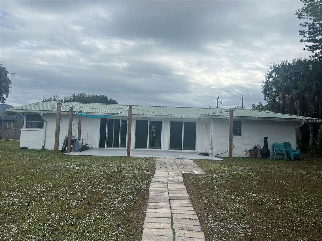 129 Northshore Terrace Punta Gorda, FL 33980 - Photo 35 of 37 front view of a house with a yard