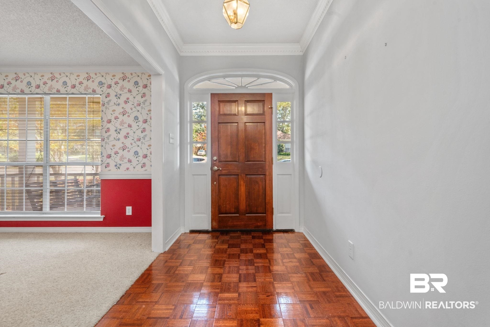 1340 Wellsley Court Mobile, AL 36695 - Photo 11 of 37 Entryway featuring ornamental molding and dark carpet