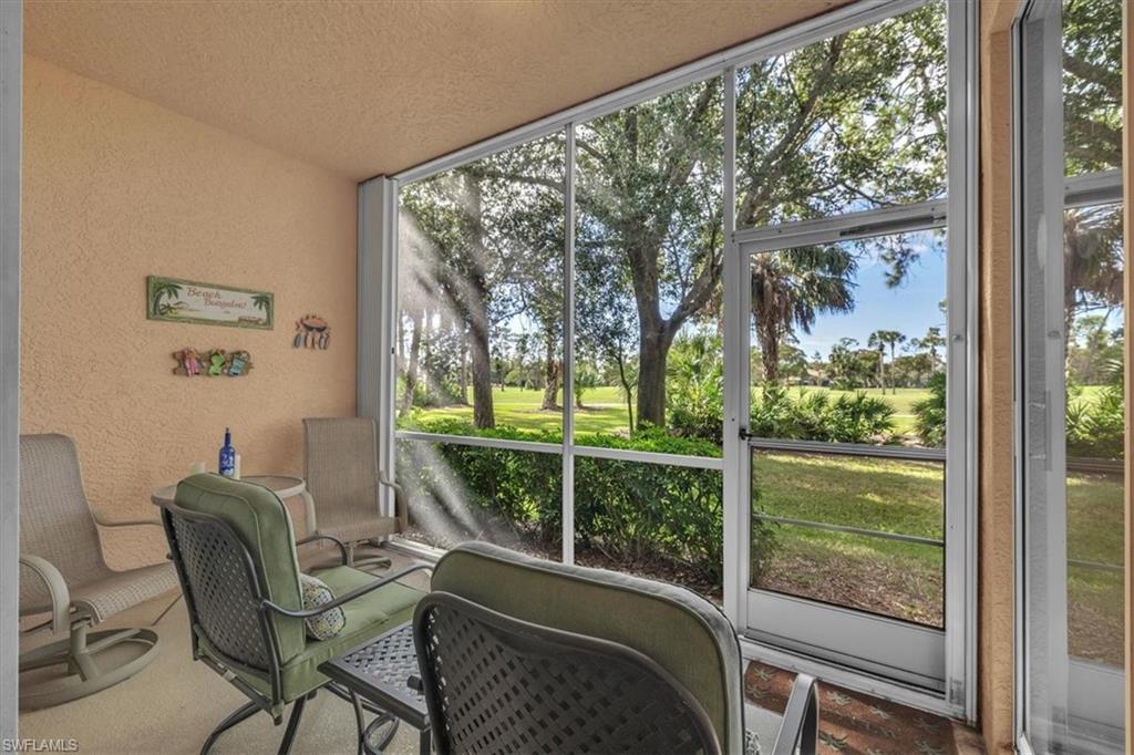 8075 Tiger Cove, Unit 1706 Naples, FL 34113 - Photo 32 of 50 View of sunroom