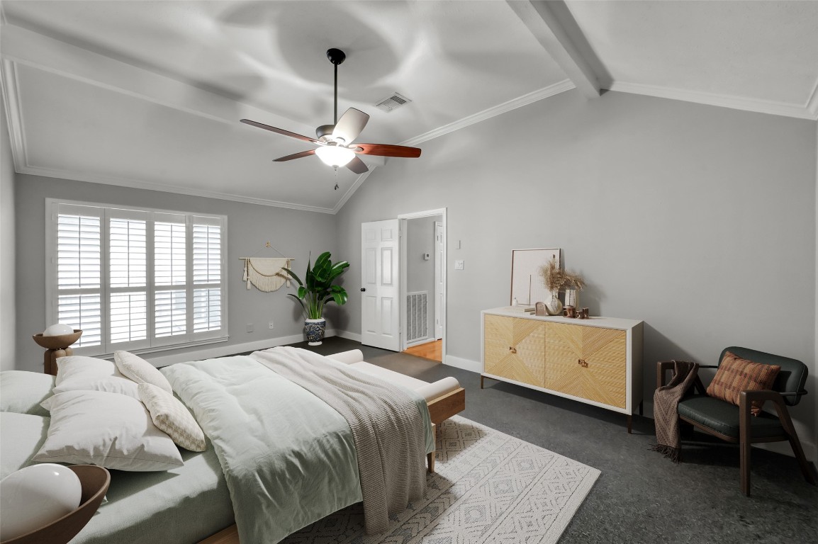 16135 Ridge Park Drive Houston, TX 77095 - Photo 15 of 27 a bedroom with a bed and a chandelier