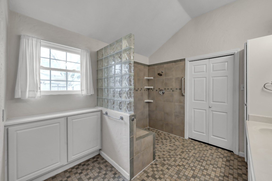16135 Ridge Park Drive Houston, TX 77095 - Photo 18 of 27 a bathroom with a shower and a sink