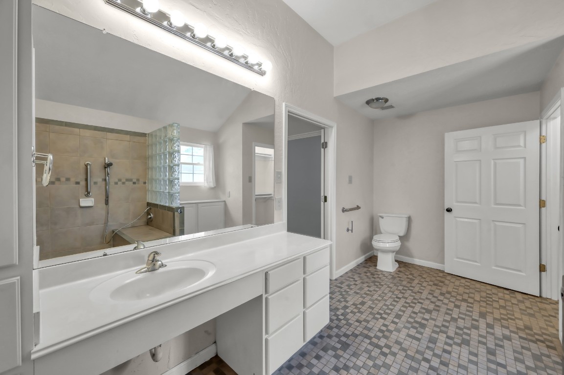 16135 Ridge Park Drive Houston, TX 77095 - Photo 19 of 27 a bathroom with a double vanity sink mirror and shower