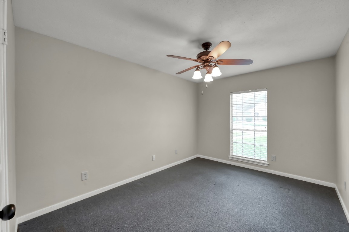16135 Ridge Park Drive Houston, TX 77095 - Photo 23 of 27 wooden floor in an empty room with a window