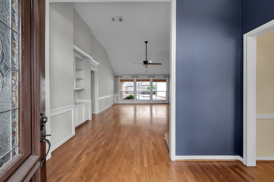 16135 Ridge Park Drive Houston, TX 77095 - Photo 6 of 27 wooden floor in an empty room with a window