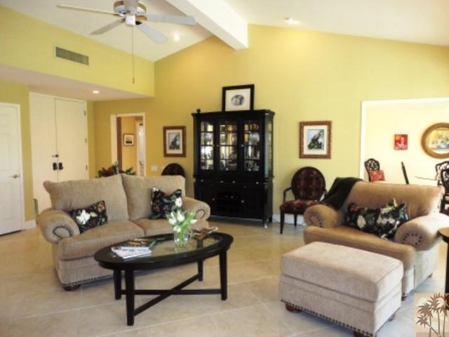 72315 Rodeo Way Rancho Mirage, CA 92270 - Photo 4 of 23 a living room with furniture and a lamp