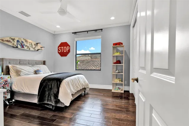 a bedroom with a bed and a cabinets