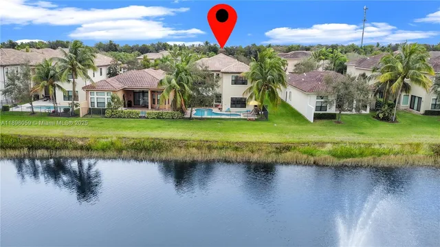 a view of a lake with a swimming pool